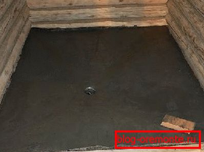 A kép egy padlózat példája, melynek lejtése a lefolyó felé mutat A kép egy padlózat példája, melynek lejtése a lefolyó felé mutat
